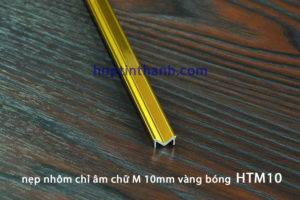 Nẹp nhôm chỉ âm chữ M HTM10 màu vàng bóng Hợp Tín Thành